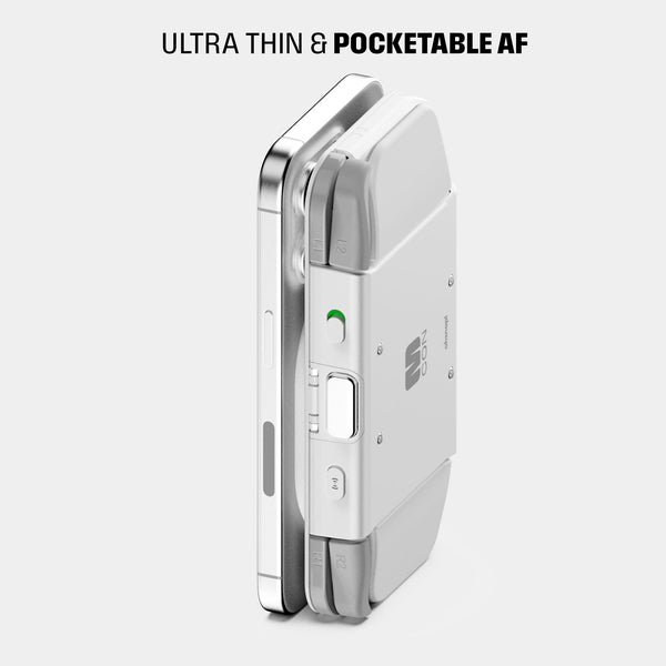 Compact, ultra-thin device with a sleek design, featuring buttons and a green indicator light.
