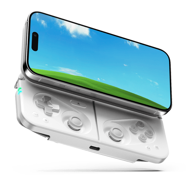 Portable gaming controller with a screen displaying a blue sky and green hills, featuring joystick and button controls.