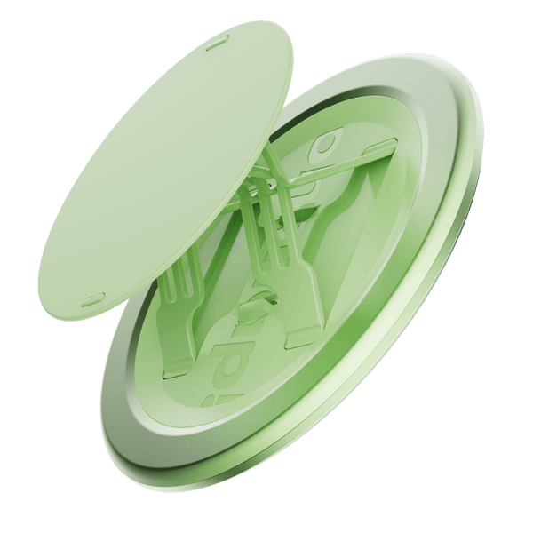 Green circular grip accessory with a flat top and adjustable arms for secure attachment.