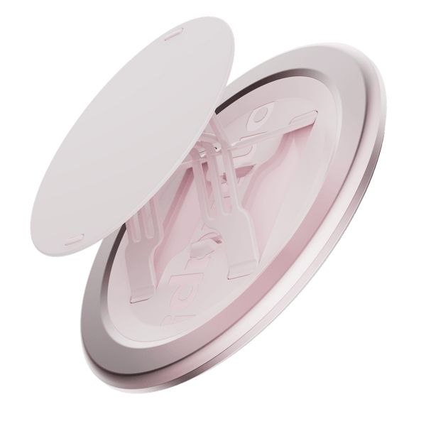 Circular phone grip in pink with a removable top and adjustable support arms.
