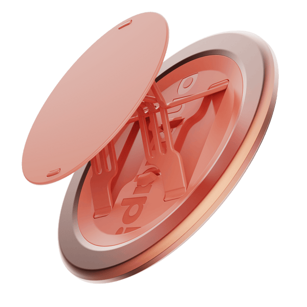 A coral-colored phone grip with a circular base and adjustable support arms.