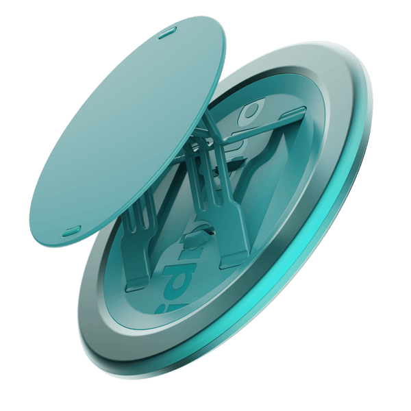 A teal circular grip accessory with a central attachment mechanism and a smooth outer edge.