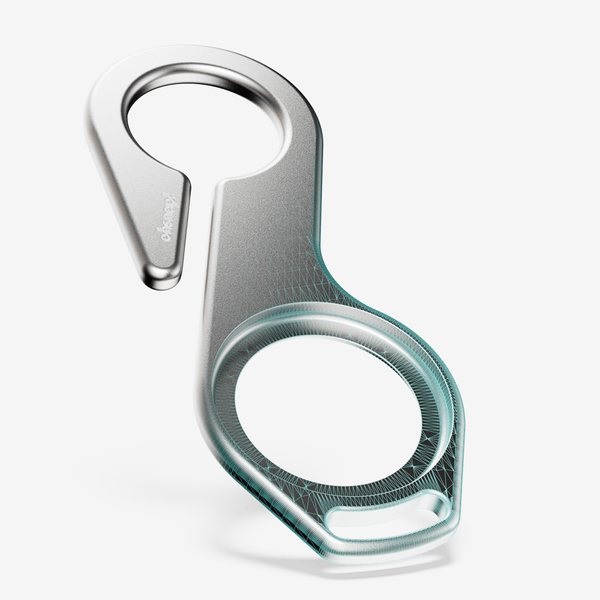 Metal key loop with a circular opening and a hook design for easy attachment.