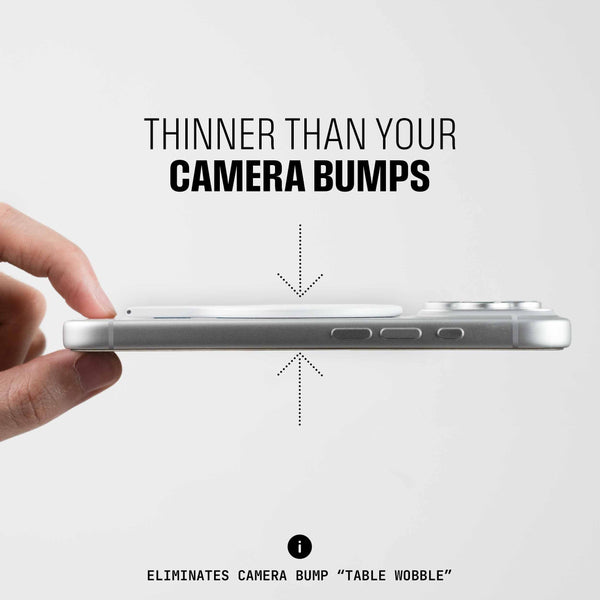 A hand holds a smartphone sideways, highlighting its thin profile compared to camera bumps.