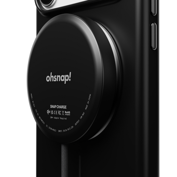Black snap case with a circular charging pad featuring the 