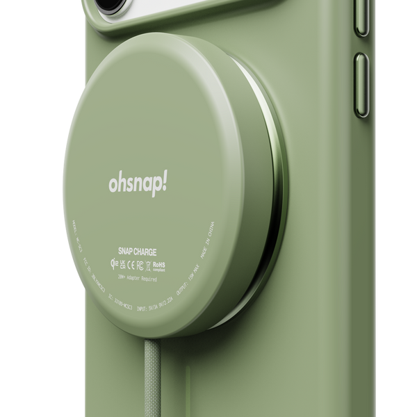 Green snap case with a circular charging pad attached, featuring the brand name 