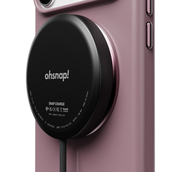 Snap case in pink with a black magnetic charging pad attached, featuring the brand name 