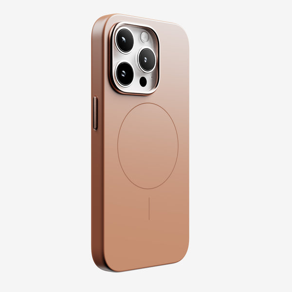Copper-colored phone case with a circular MagSafe alignment feature and a side button cutout.