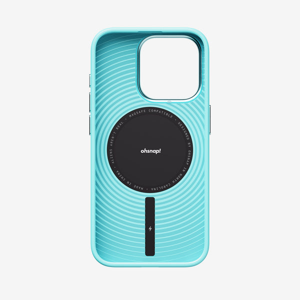 Light blue phone case with a circular black MagSafe-compatible attachment and textured wave design.