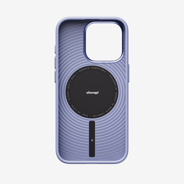 Purple phone case with a circular design and MagSafe compatibility, featuring a textured interior.