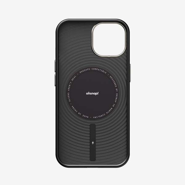 Black phone case with circular design and MagSafe compatibility, featuring a central logo and charging indicator.