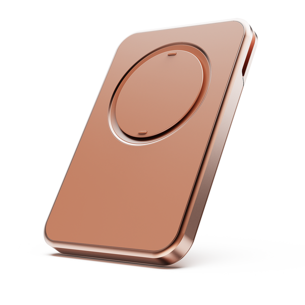 Slim, rectangular wallet in a copper finish with a circular grip area on one side.