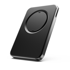 Black wallet with a circular magnetic attachment area and a sleek, minimalist design.