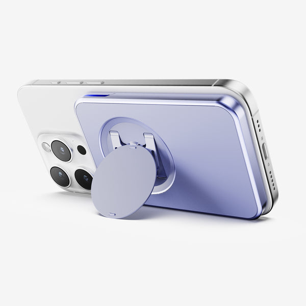 Wallet attachment in purple color mounted on the back of a smartphone, featuring a circular grip.