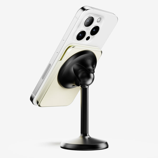 Wallet attached to a smartphone, mounted on a black stand, displaying a minimalist design.