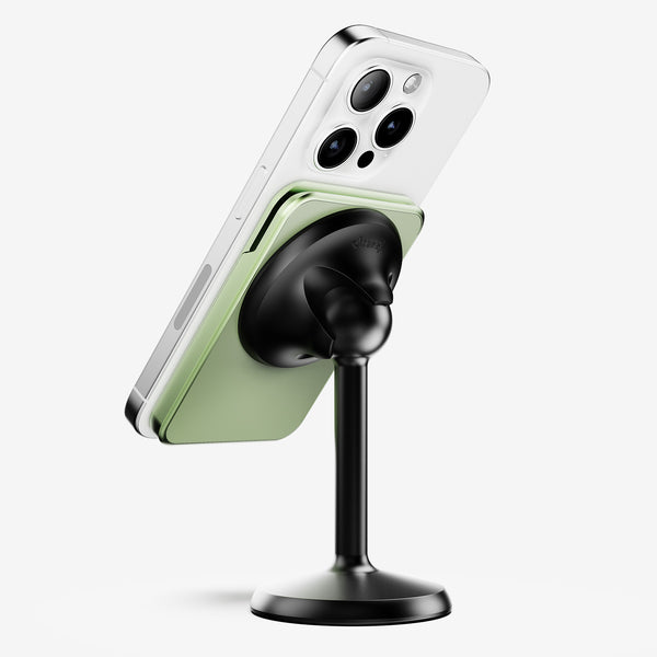 Wallet attached to a smartphone, mounted on a black stand, with a green wallet section visible.