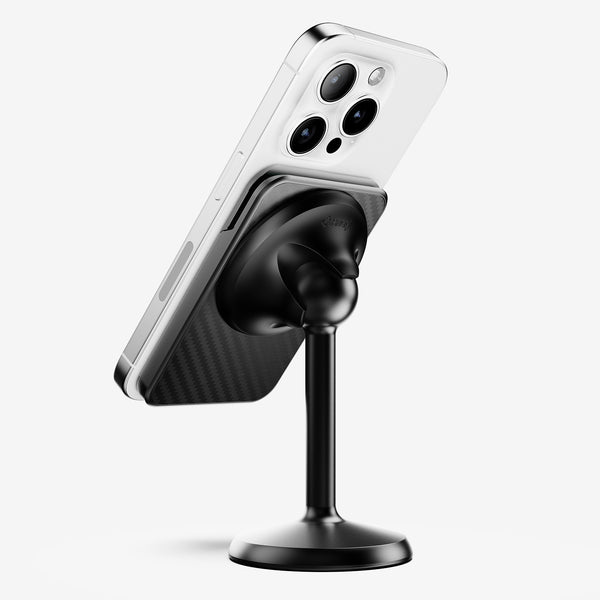 Wallet attached to a smartphone, mounted on a black stand, showcasing a sleek design with a carbon fiber texture.