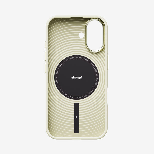 Light green phone case with circular design and MagSafe compatibility, featuring a black center and charging indicator.