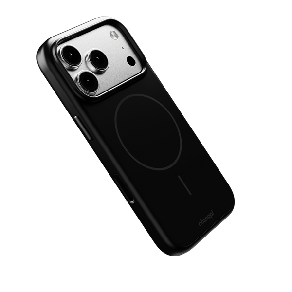 Black snap case designed for a smartphone, featuring a circular area for wireless charging.