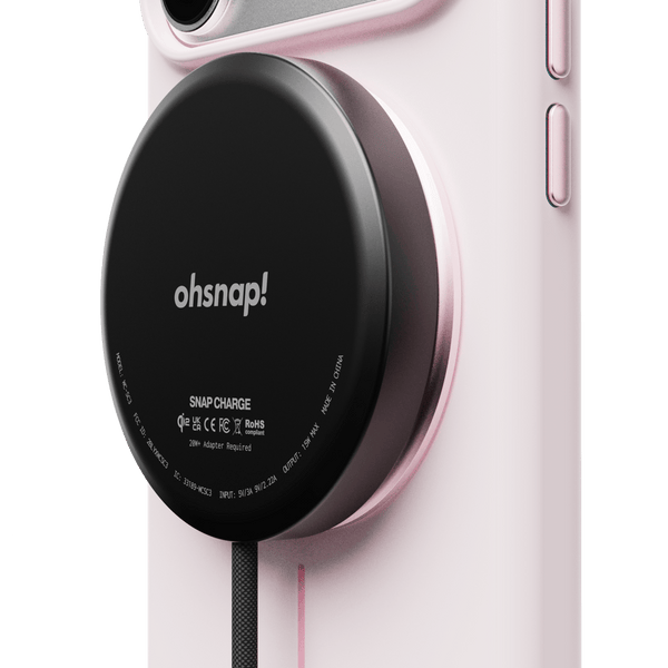 Snap case in pink with a black magnetic charging pad attached, featuring the brand name 