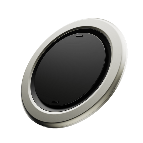 Circular device with a black surface and a silver outer ring, featuring two small ports.