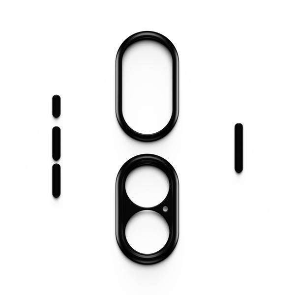 Black trim kit components for a snap case, including various shapes and sizes for customization.