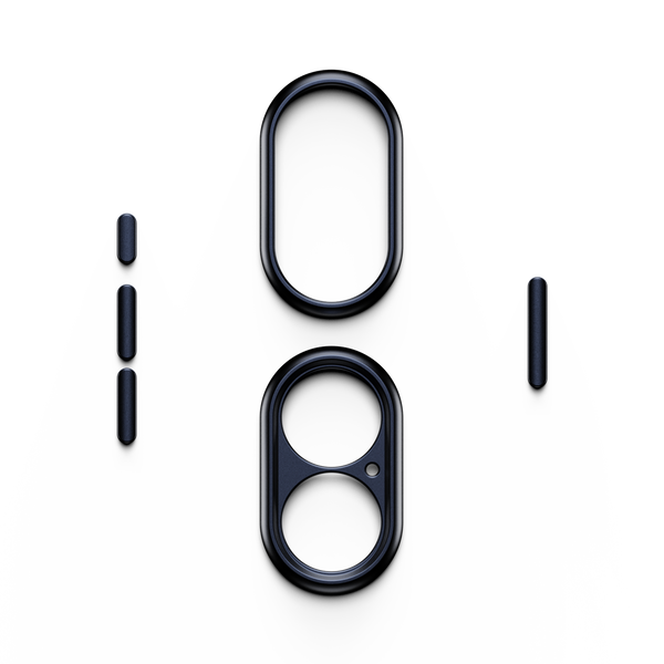 Black trim kit pieces for a snap case, including two camera lens covers and several button covers.