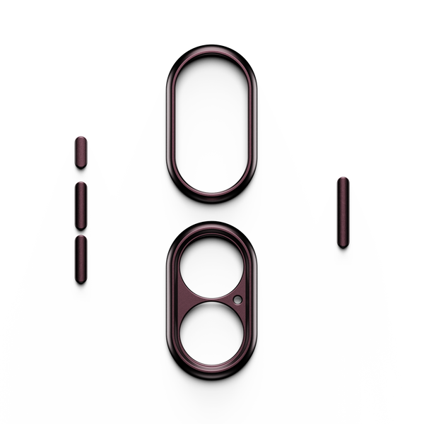 Trim kit components in a dark metallic finish, including two oval and three rectangular pieces.