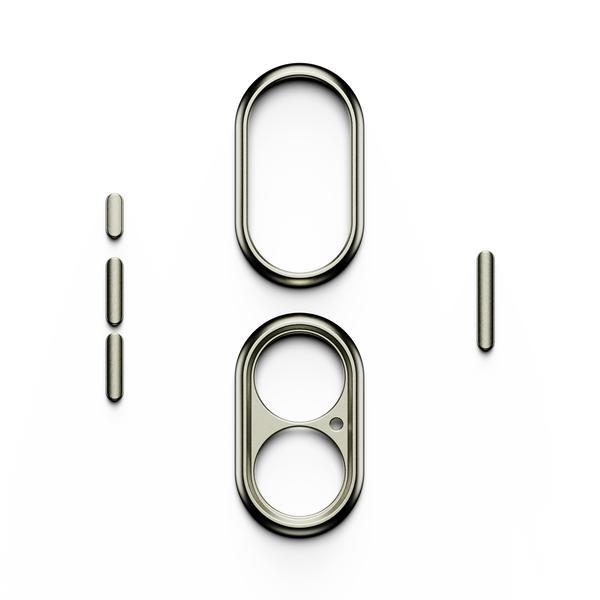 Trim kit components including two oval frames and several small connectors in a metallic finish.