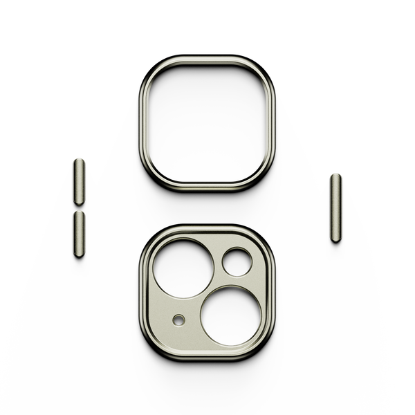 Trim kit components including a square frame and circular camera cutouts in a metallic finish.