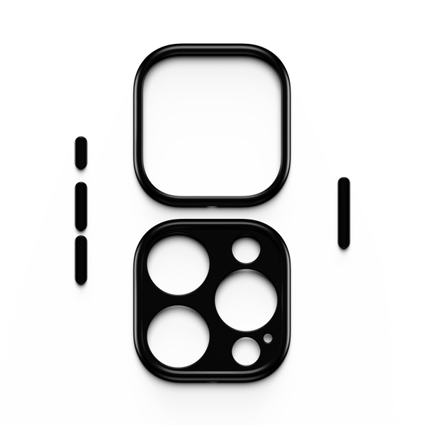 Black trim kit components for a snap case, including a square frame and a camera lens cover with circular cutouts.