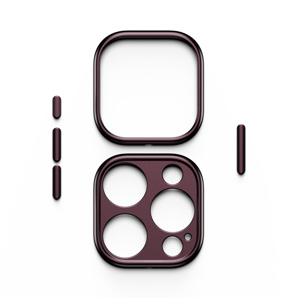 Trim kit components in burgundy, including a square frame and a camera lens cover with circular cutouts.
