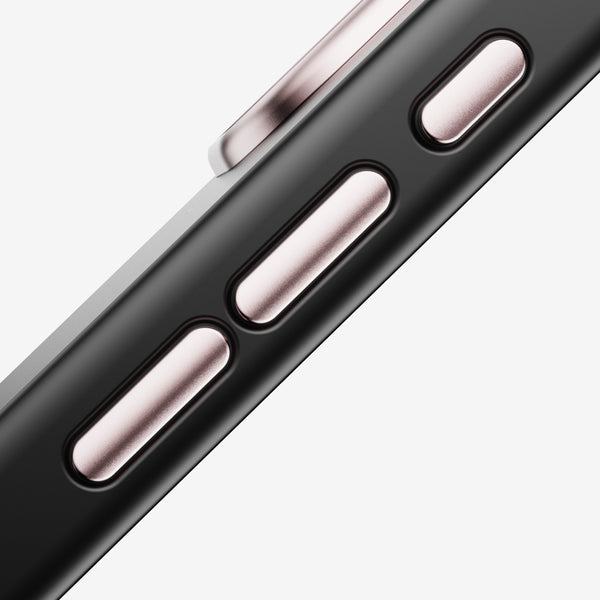 Close-up of a black snap case featuring rose gold volume and power buttons.