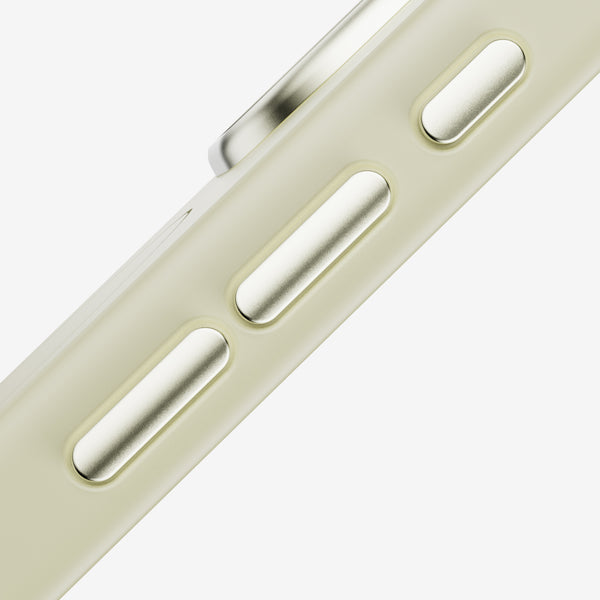 Close-up of a snap case showing buttons and a textured surface in a light color.