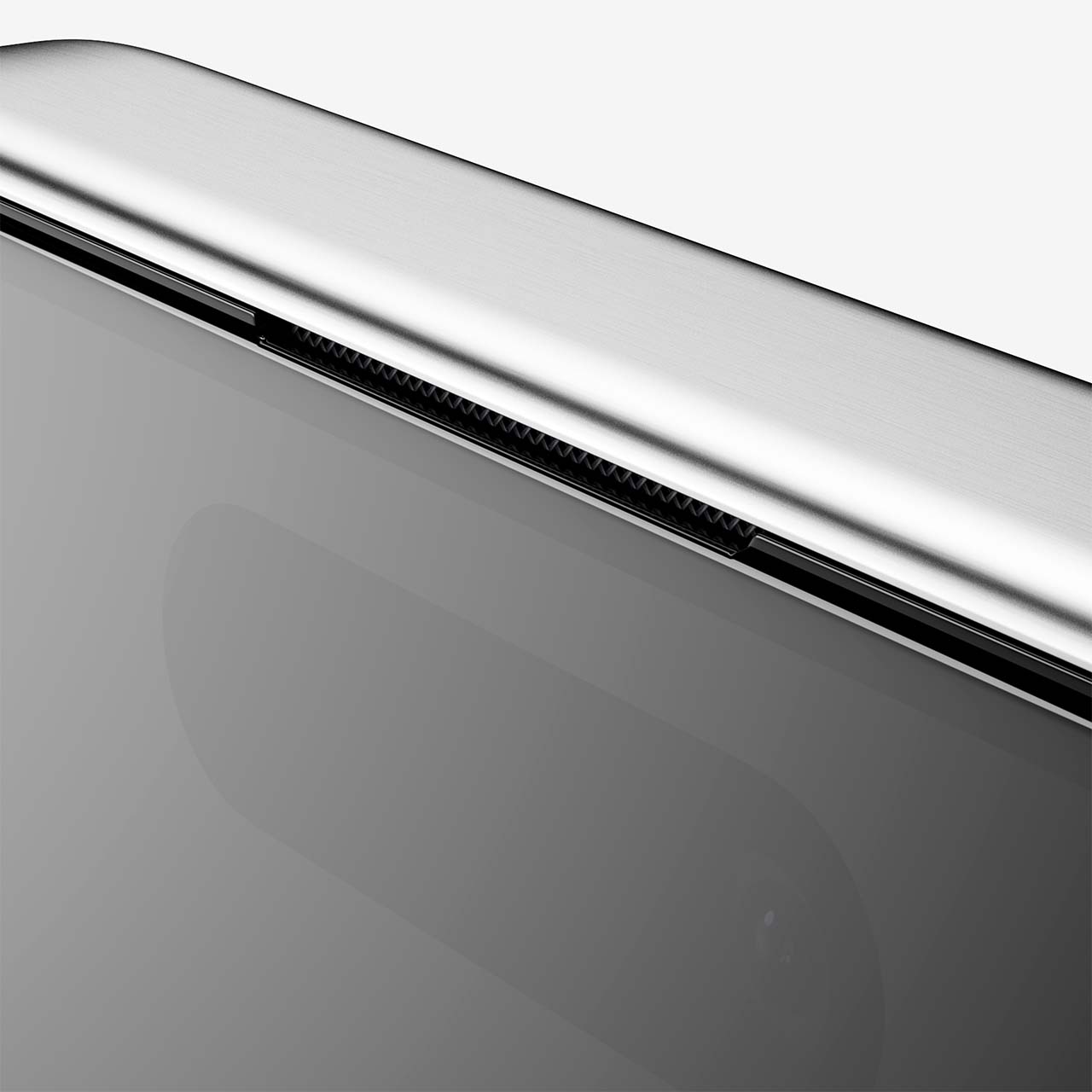 Close-up of a glass screen protector positioned on a device, showing the edge and surface clarity.