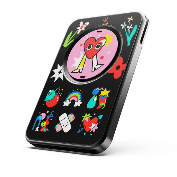Wallet featuring a black background with colorful graphic designs, including hearts, flowers, and stars.