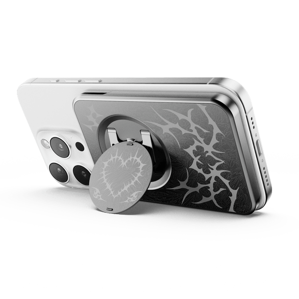 Wallet attachment on a smartphone with a circular grip and a textured design on the back.